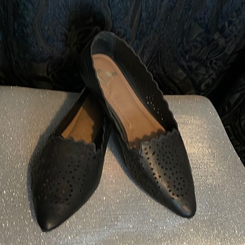 Report brand black flats